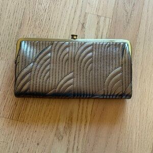 Like new leather HOBO Lauren wallet with gold hardware.